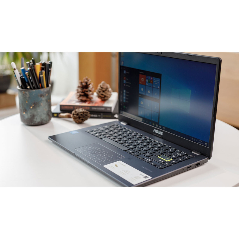 لپ‌تاپ ایسوس مدل Vivobook Go 14 E410KA-CL464 با پردازنده Celeron N4500، رم DDR4 4GB، حافظه eMMC با ظرفیت 64GB، نمایشگر 14 اینچ TN با وضوح HD، دارای نامبرپد دیجیتال