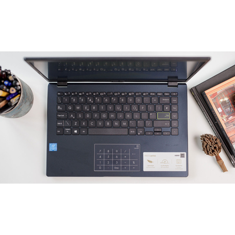 لپ‌تاپ ایسوس مدل Vivobook Go 14 E410KA-CL464 با پردازنده Celeron N4500، رم DDR4 4GB، حافظه eMMC با ظرفیت 64GB، نمایشگر 14 اینچ TN با وضوح HD، دارای نامبرپد دیجیتال